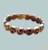 Sized toe ring with curled design